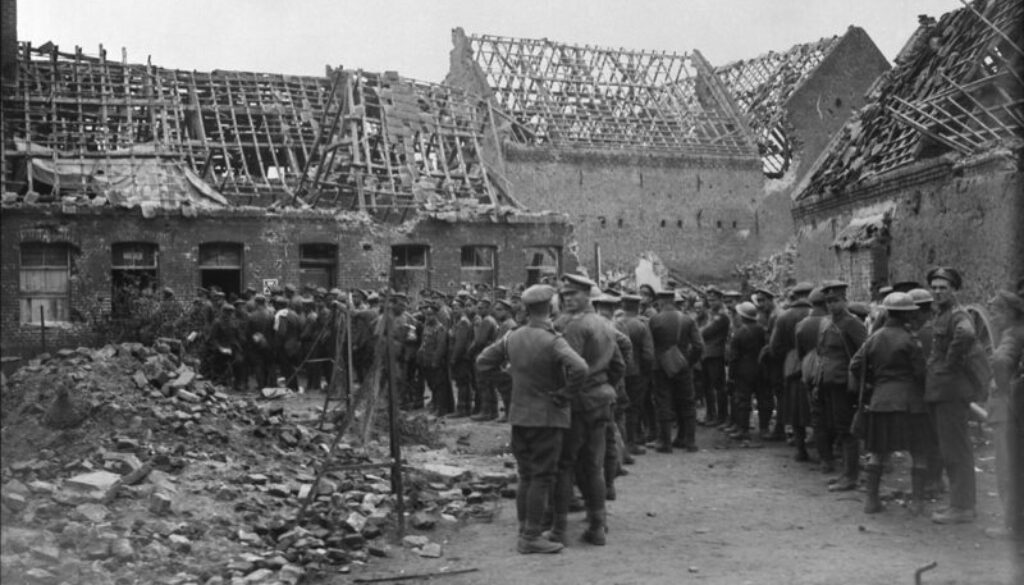 243_Canadians at Y.M.C.A. in ruined village, Sailly. Advance East of Arras. October, 1918.